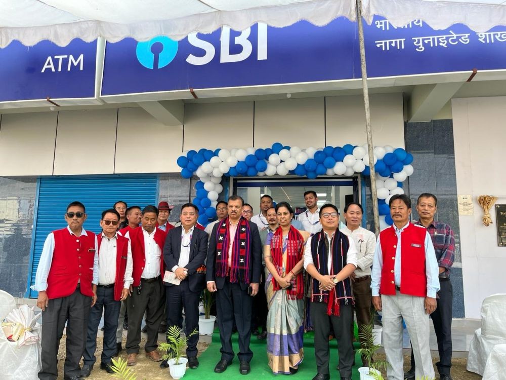 Chief General Manager (CGM), North East circle, Vincent MD (center) along with other guests during the official opening of the new Naga United Branch in Chümoukedima on March 15. (Morung Photo)